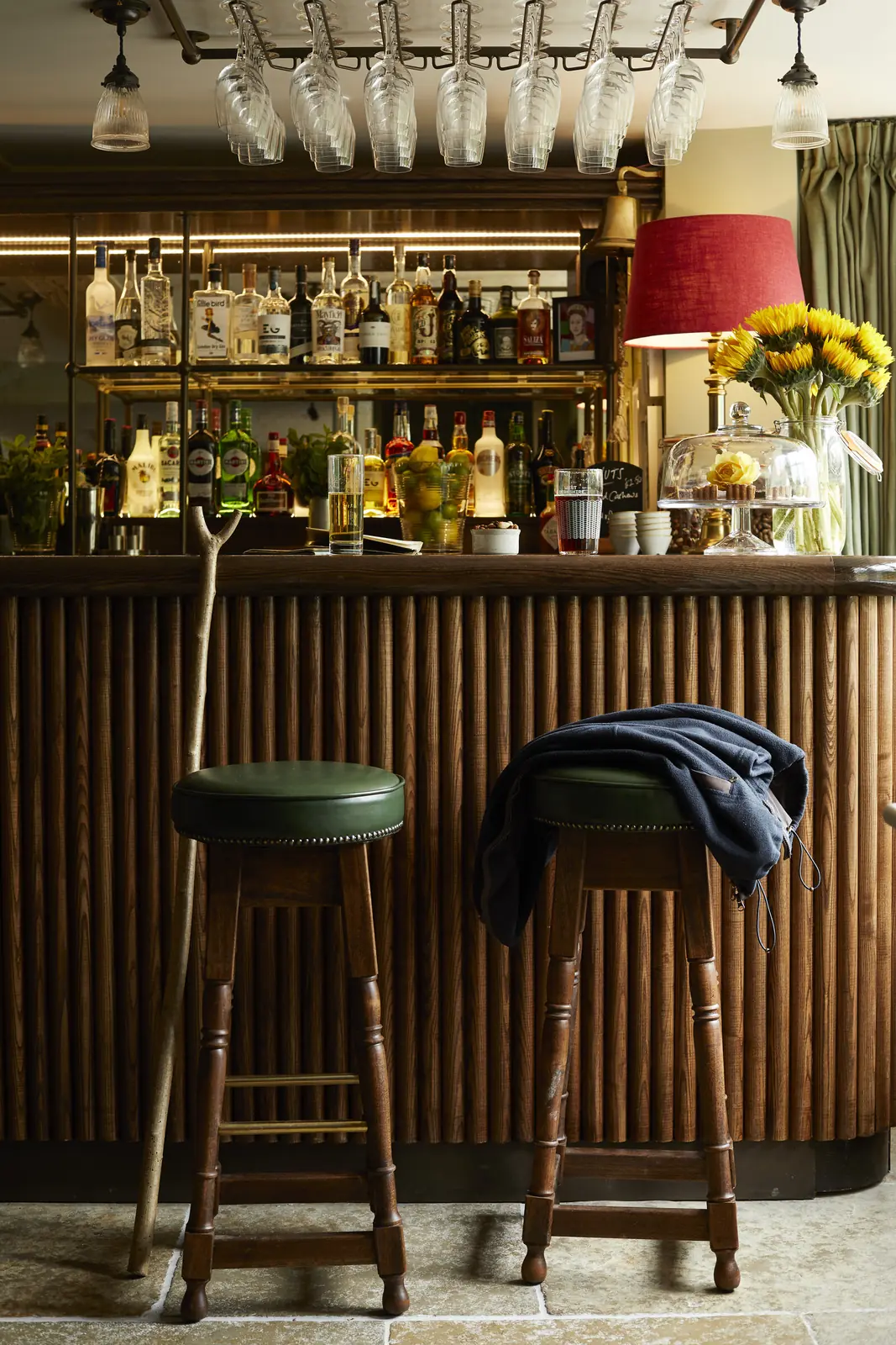Bar stools at the panelled bar
