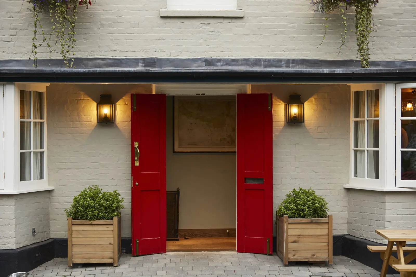 The red front doors of the Crown & Anchor