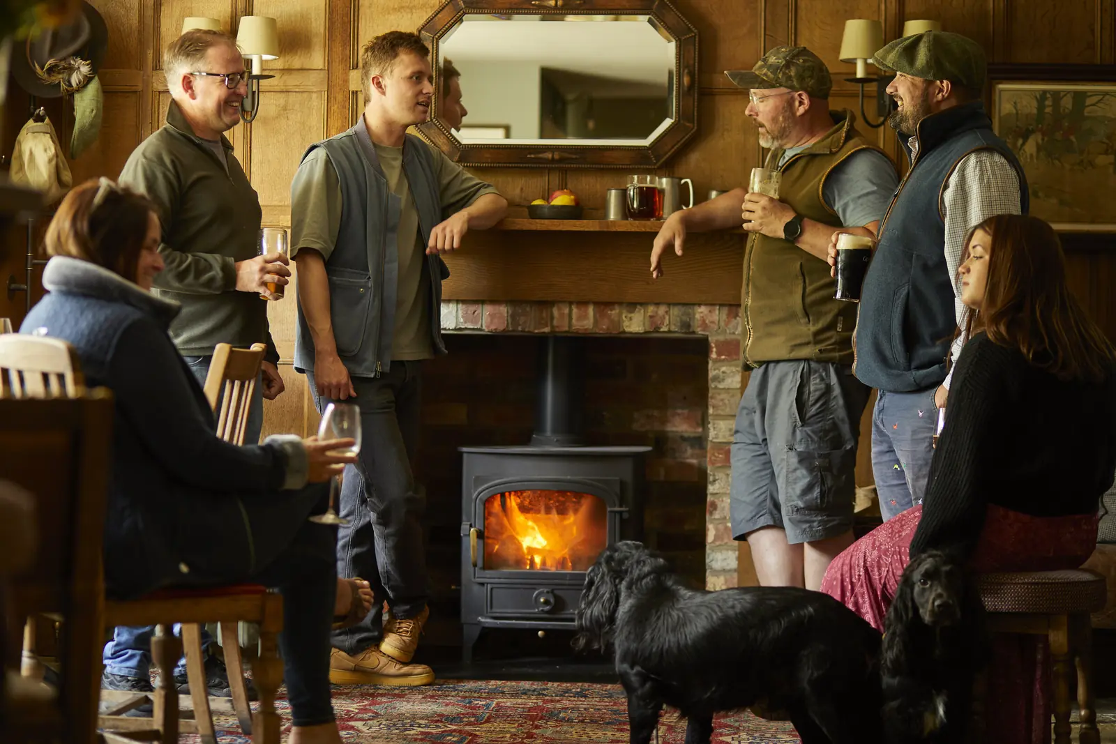 Guests and dogs gathered round the fire