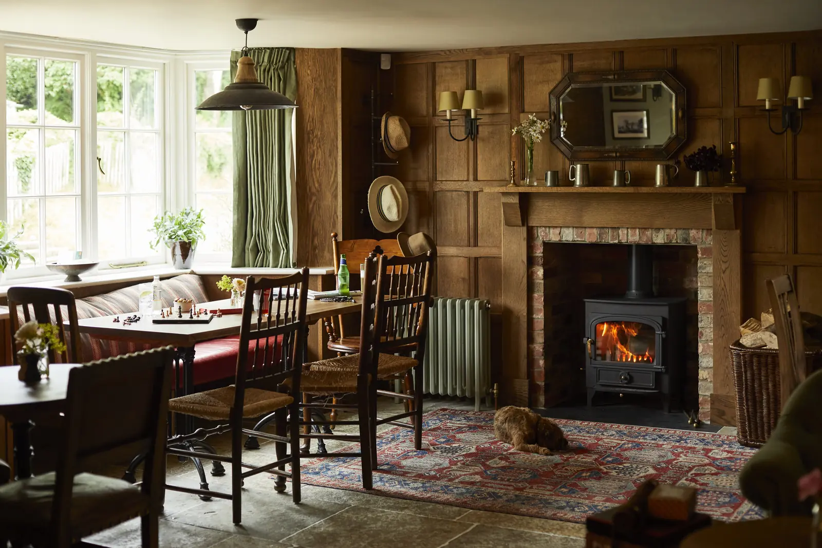 The panelled bar with its log burner