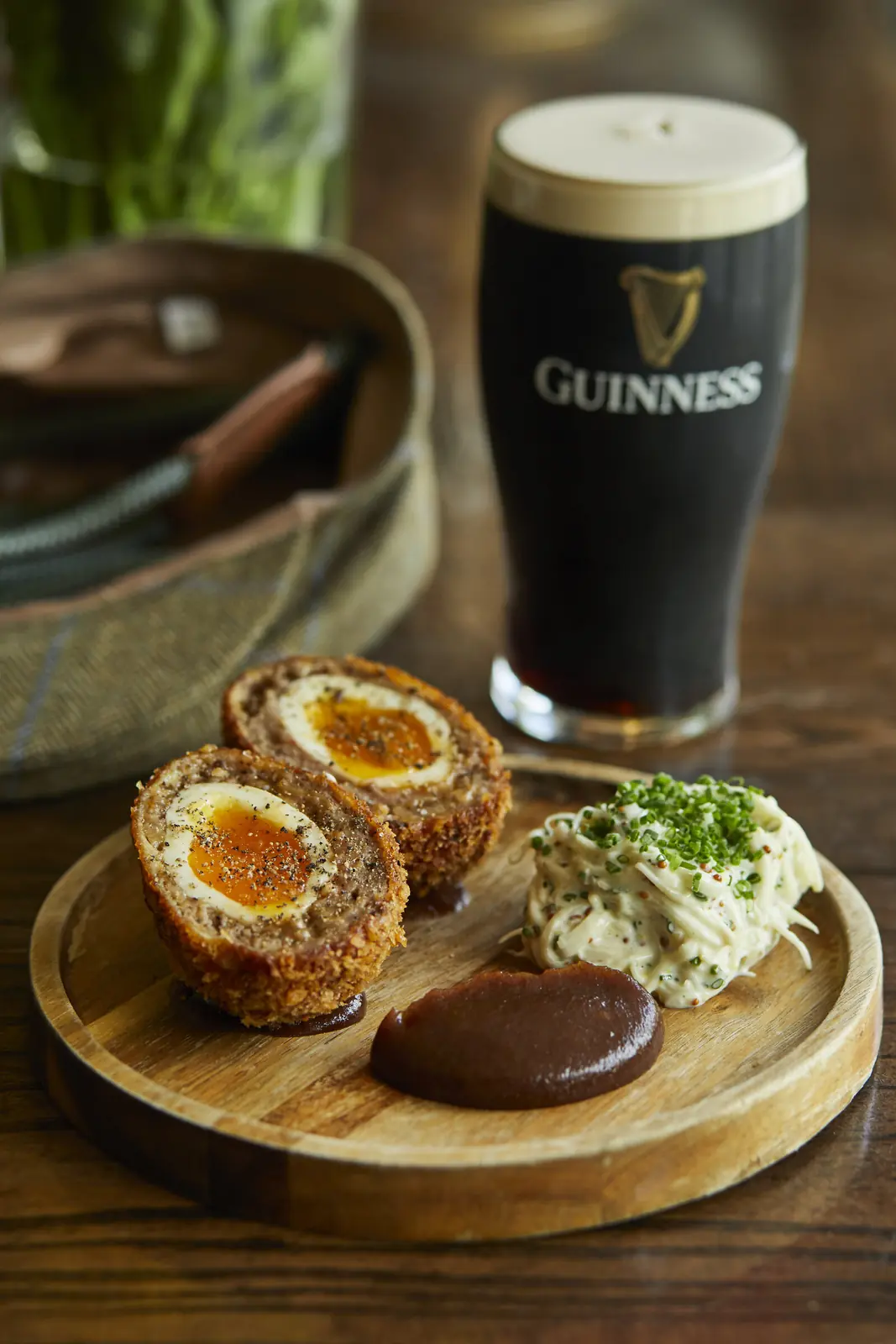 Scotch eggs with piccalilli and a pint of Guinness
